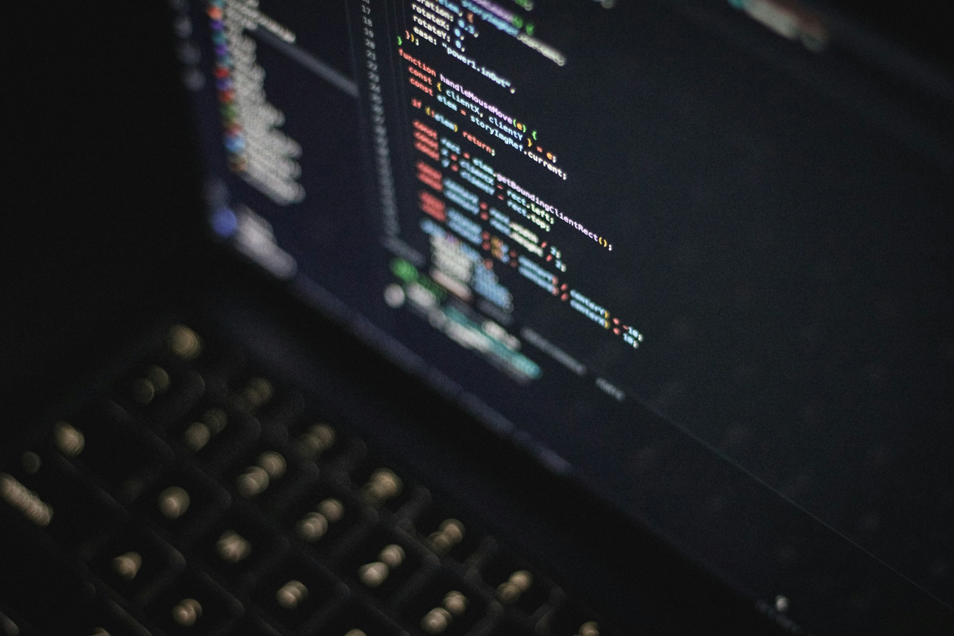 Computer screen displaying colorful code in an editor